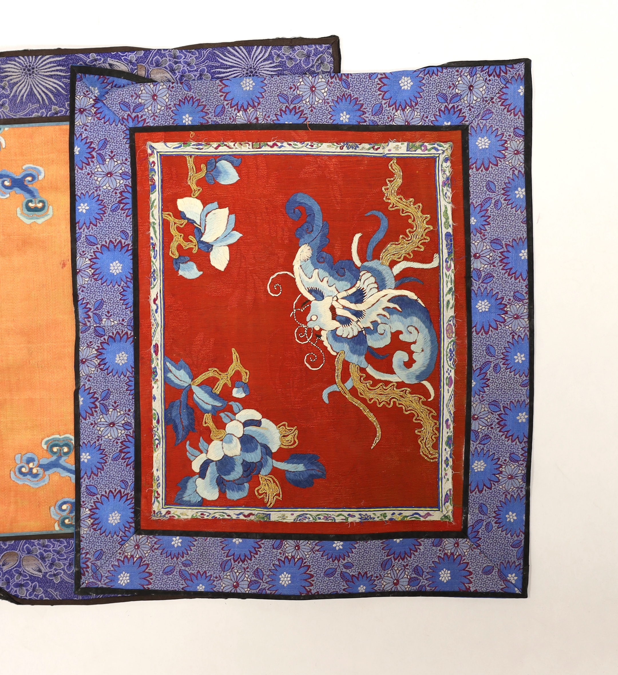 Nine Chinese silk embroidered panels, framed with silk damask borders, circa 20th century, largest 37cm x 41cm
